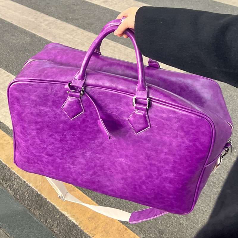 旅行バッグ 上質な革素材のボストンバッグ