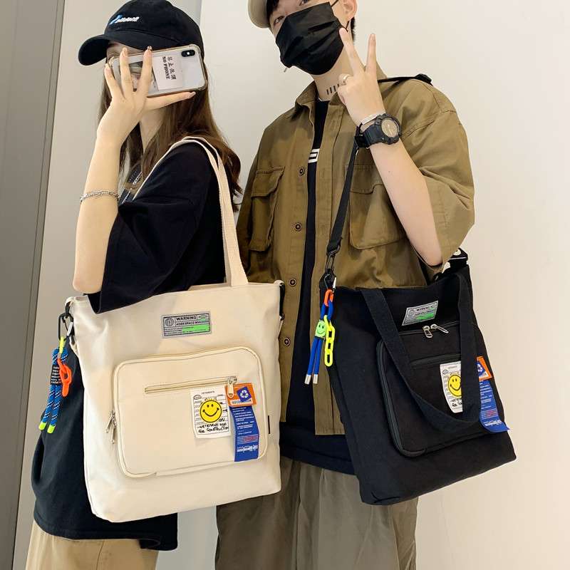 旅行バッグ 笑顔のワッペン付き多機能トート