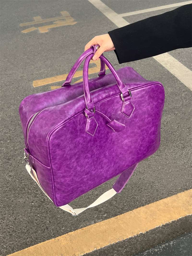 旅行バッグ 上質な革素材のボストンバッグ