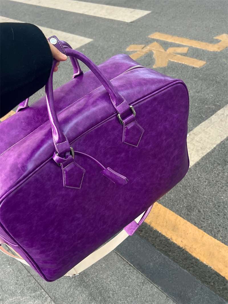旅行バッグ 上質な革素材のボストンバッグ