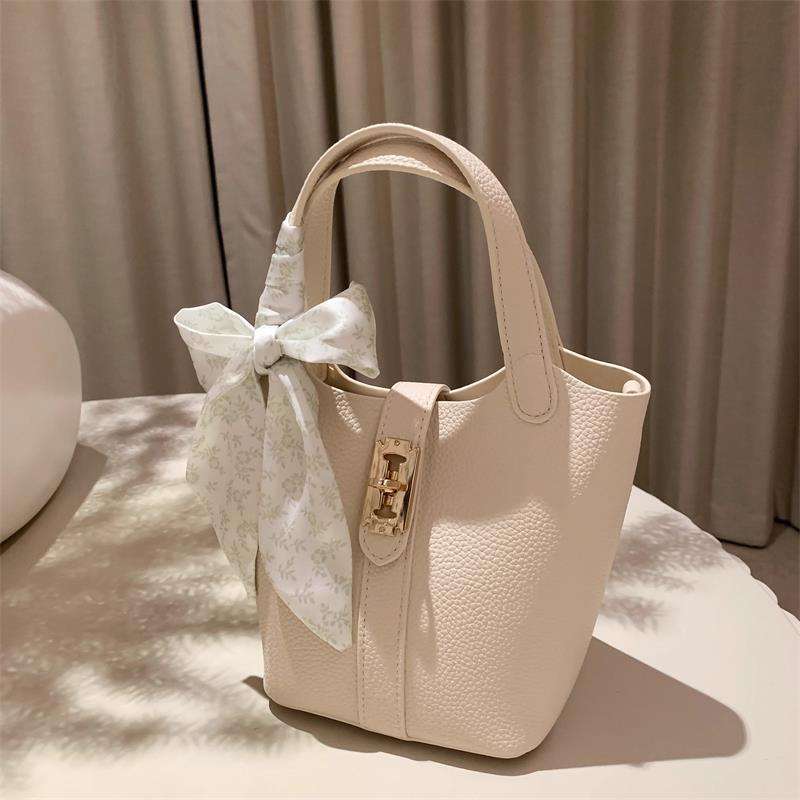 旅行バッグ 上品リボン付きレザー調ミニハンドバッグ