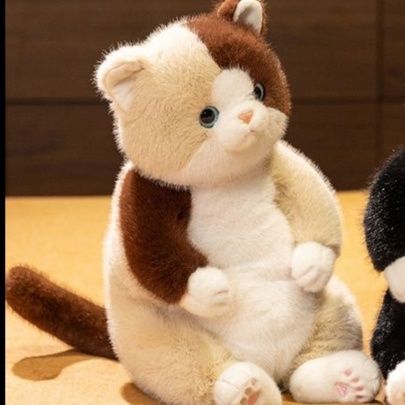 猫ぬいぐるみ まんまるしっぽの夢見るにゃんこ