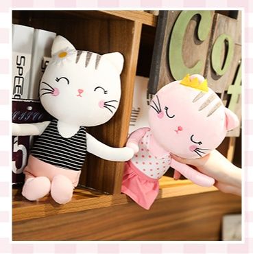 猫ぬいぐるみ お花飾り付き愛らしい表情の癒し系猫人形