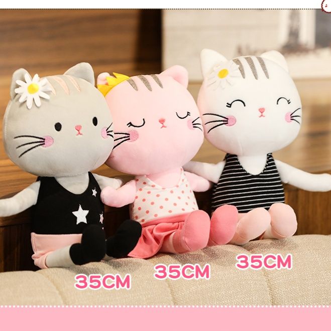 猫ぬいぐるみ お花飾り付き愛らしい表情の癒し系猫人形