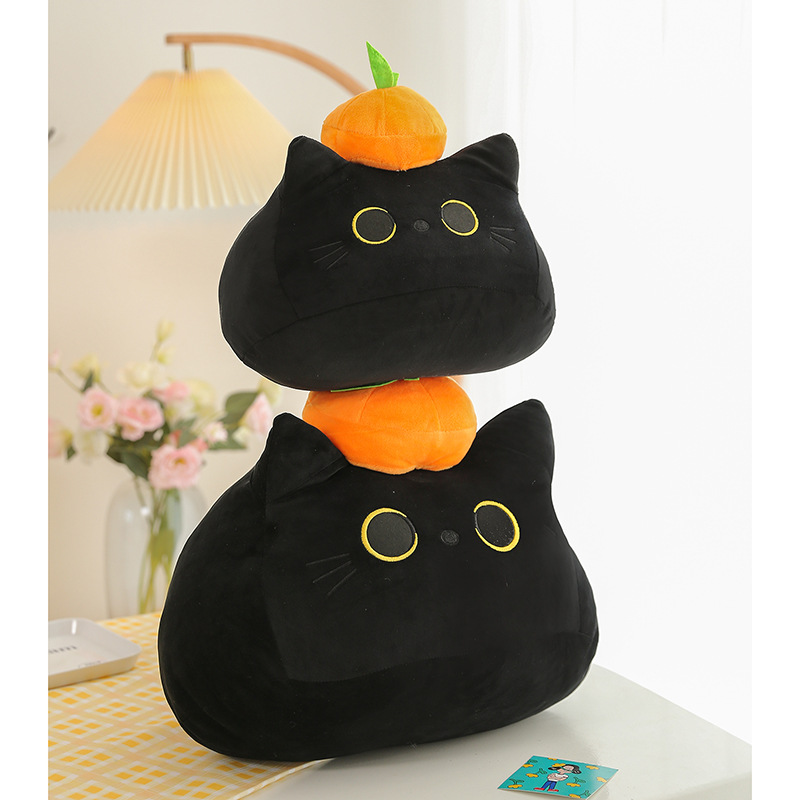 みかん帽子のまん丸おめめ黒猫ぬいぐるみ