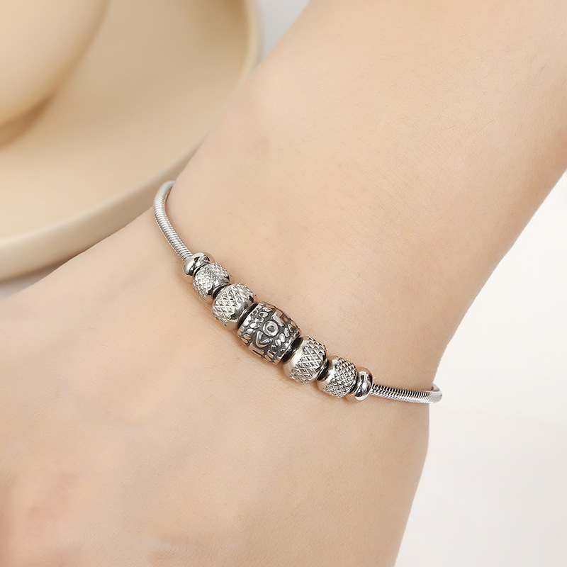 ペアブレスレット ハート飾り付き球体装飾ペアブレスレット