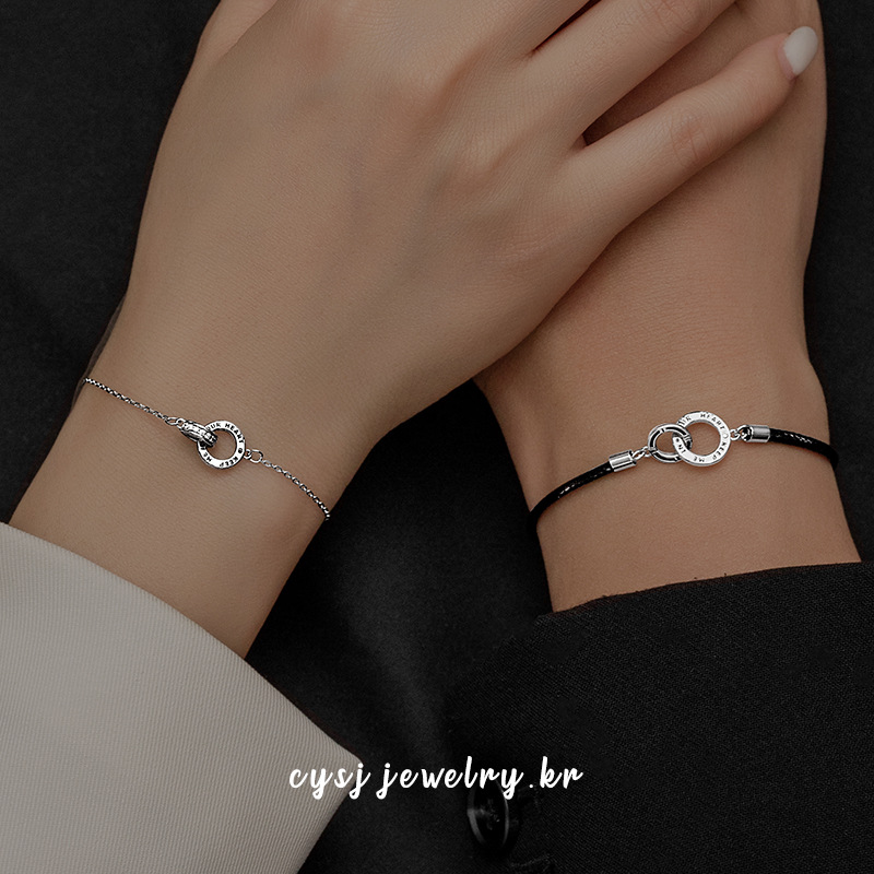 二重リングモチーフ編み込み紐ペアブレスレット