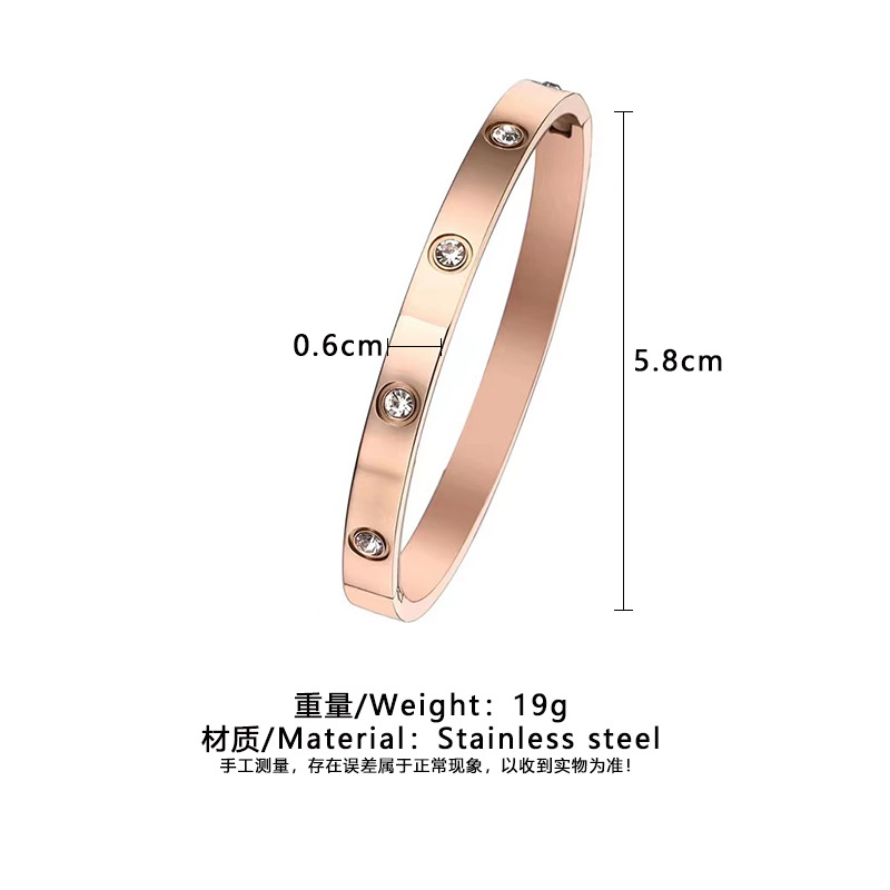 煌めく石飾りステンレスバングルペアブレスレット