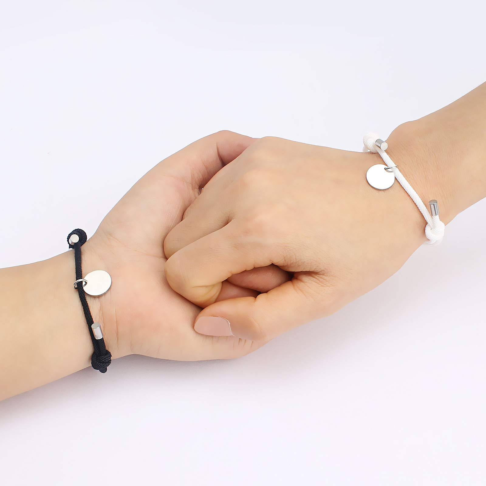 円形プレート付き編み紐ステンレスペアブレスレット