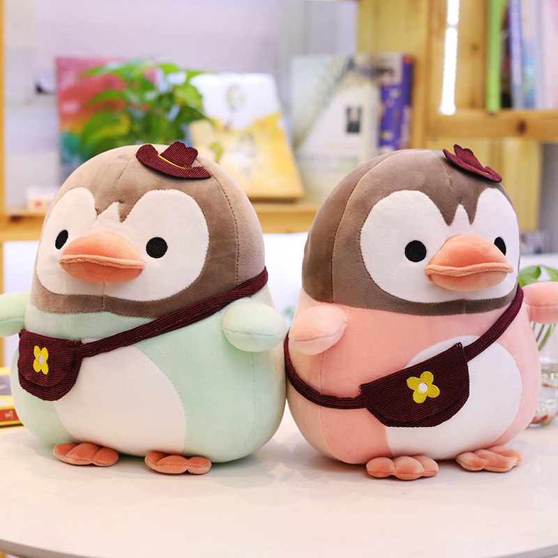 ペンギングッズ・ペンギンぬいぐるみ お花のポシェット付きペンギンぬいぐるみ