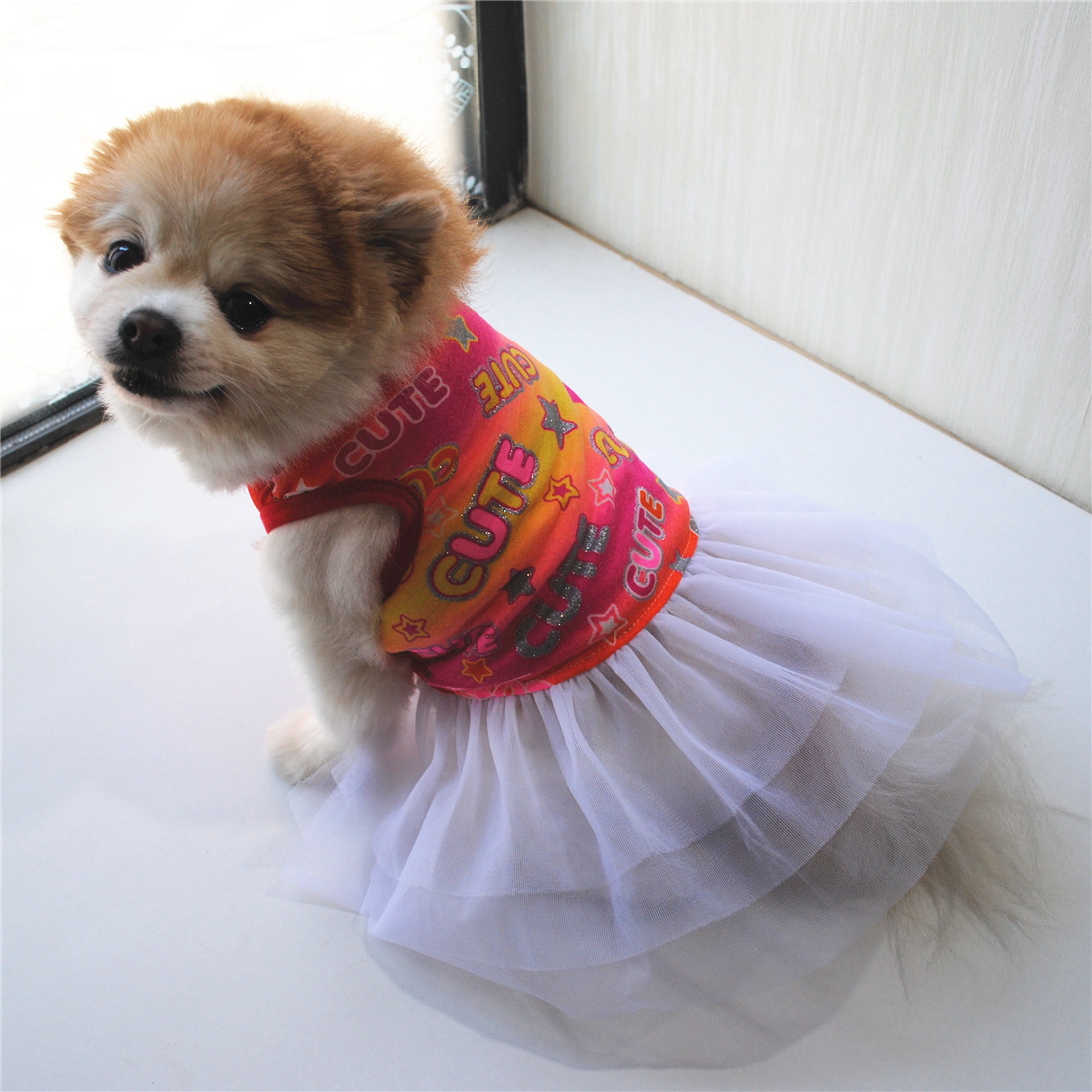 犬服 笑顔柄チュールスカート付き犬用ワンピース