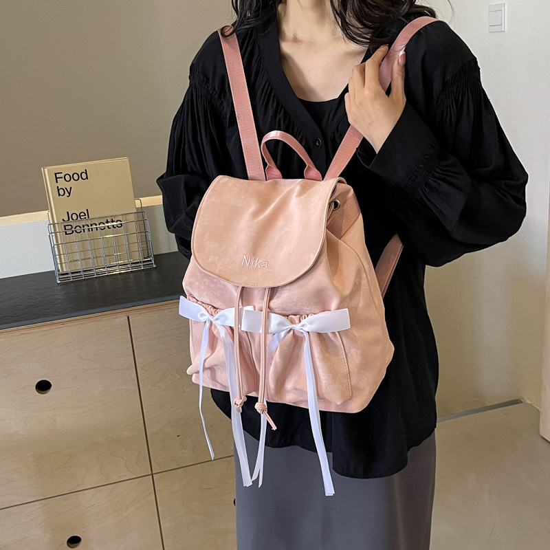 普段使いに最適なレディースリュック巾着型背負い鞄5色展開