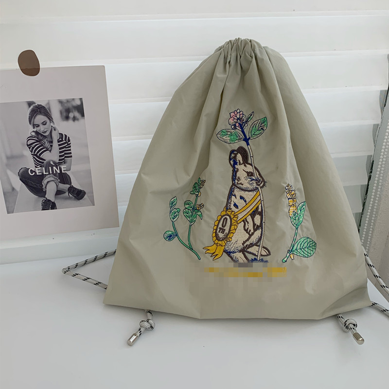 防水リュック イラスト刺繍ナップ巾着リュック