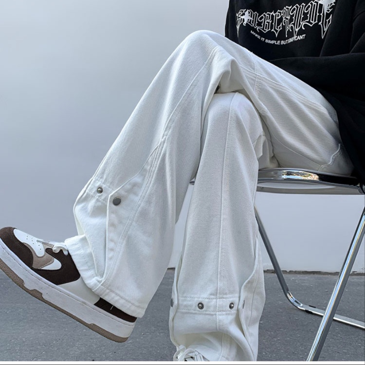 白パンツ ゆったりシルエット裾ボタン付きパンツ