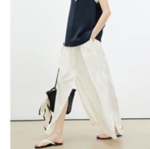 白パンツ 優雅スリット入りワイドパンツ