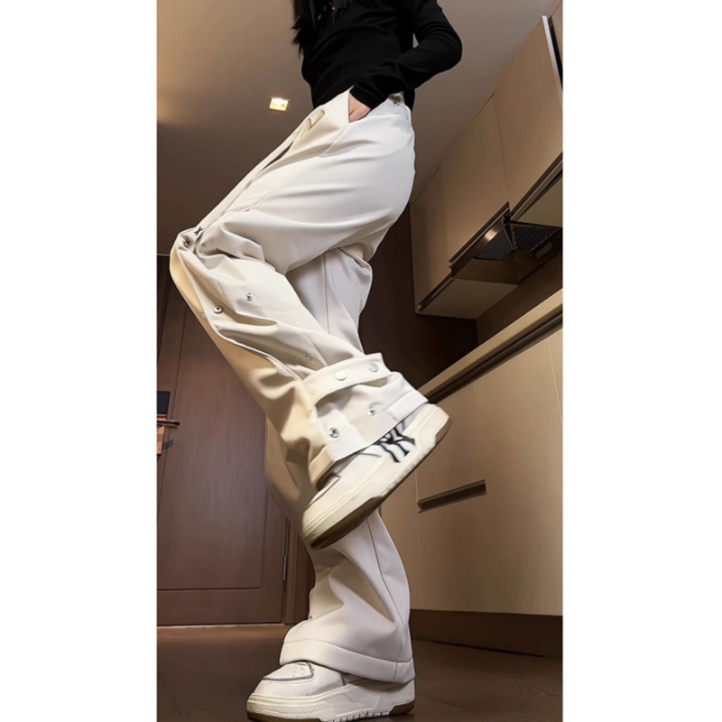 白パンツ スナップボタン付き裾広がりパンツ