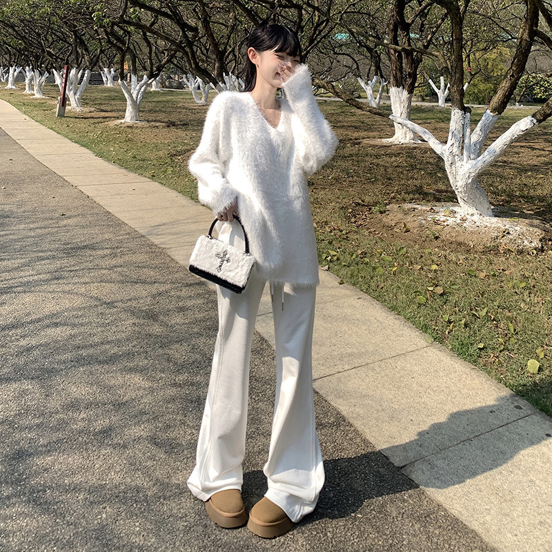 白パンツ 裾広がりリラックステーパードパンツ