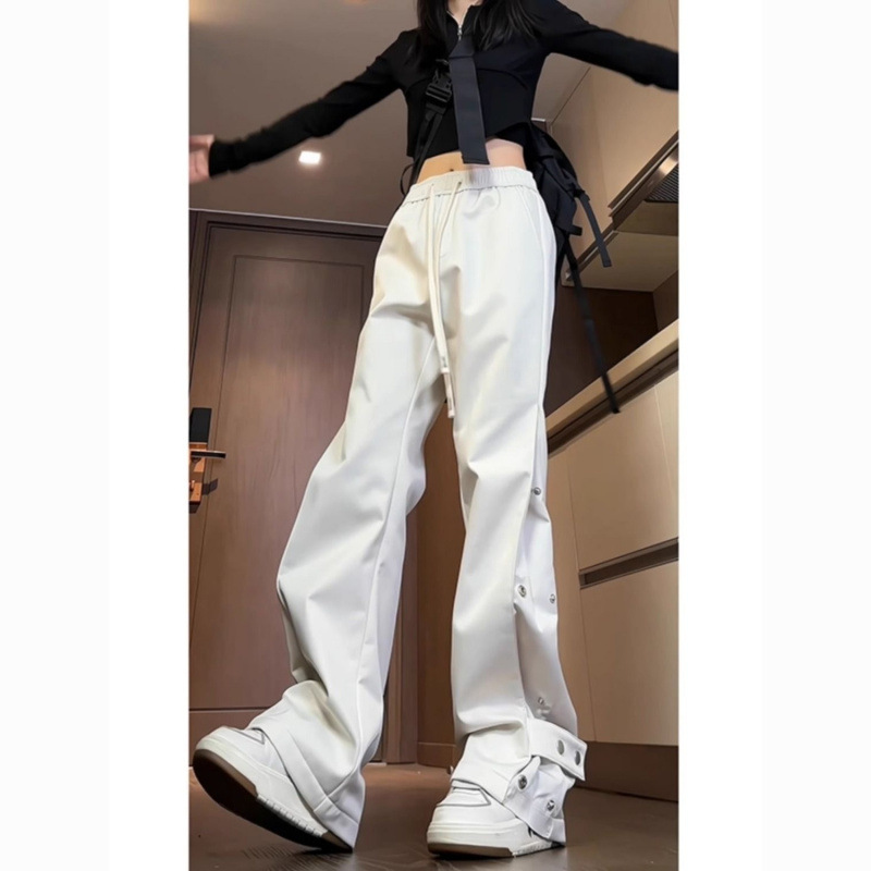 白パンツ スナップボタン付き裾広がりパンツ