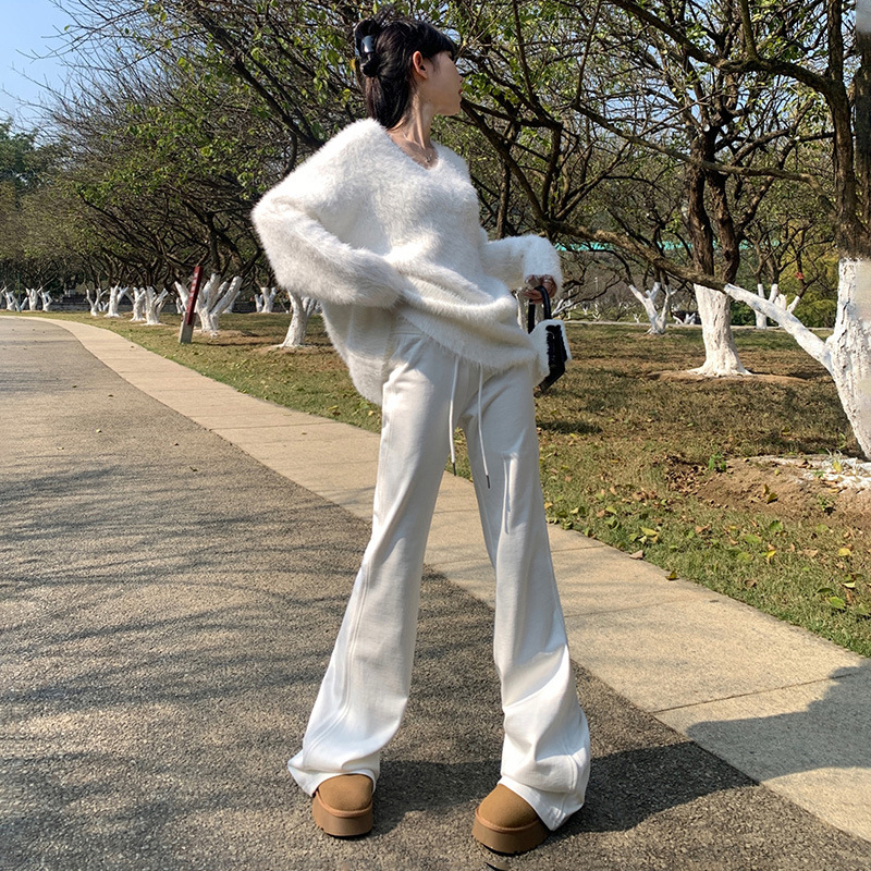 白パンツ 裾広がりリラックステーパードパンツ