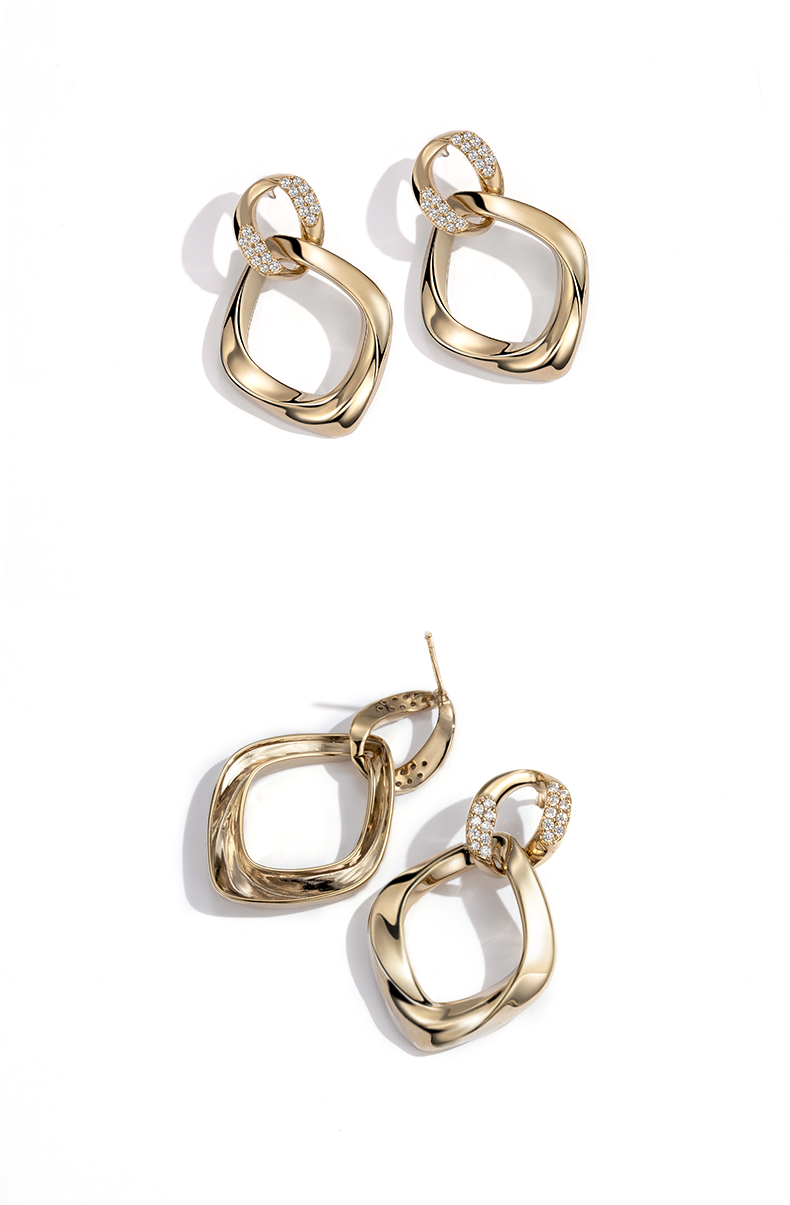 シルバーアクセサリー 洗練形状 ねじれ輪ピアス