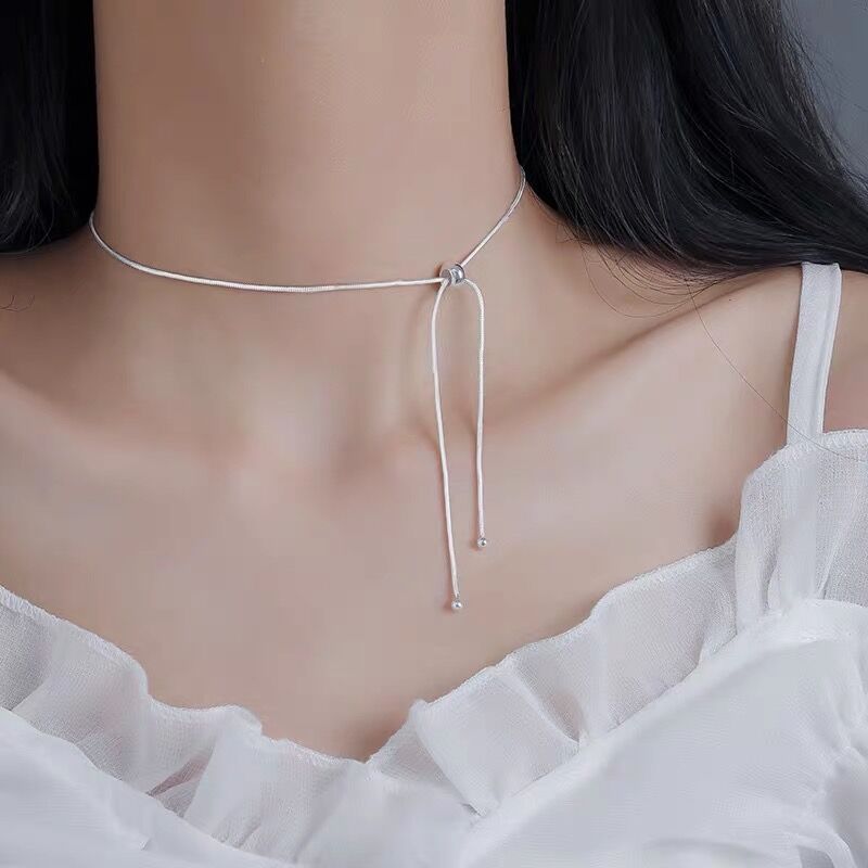 シルバーアクセサリー 流れる雫のリボンチョーカー