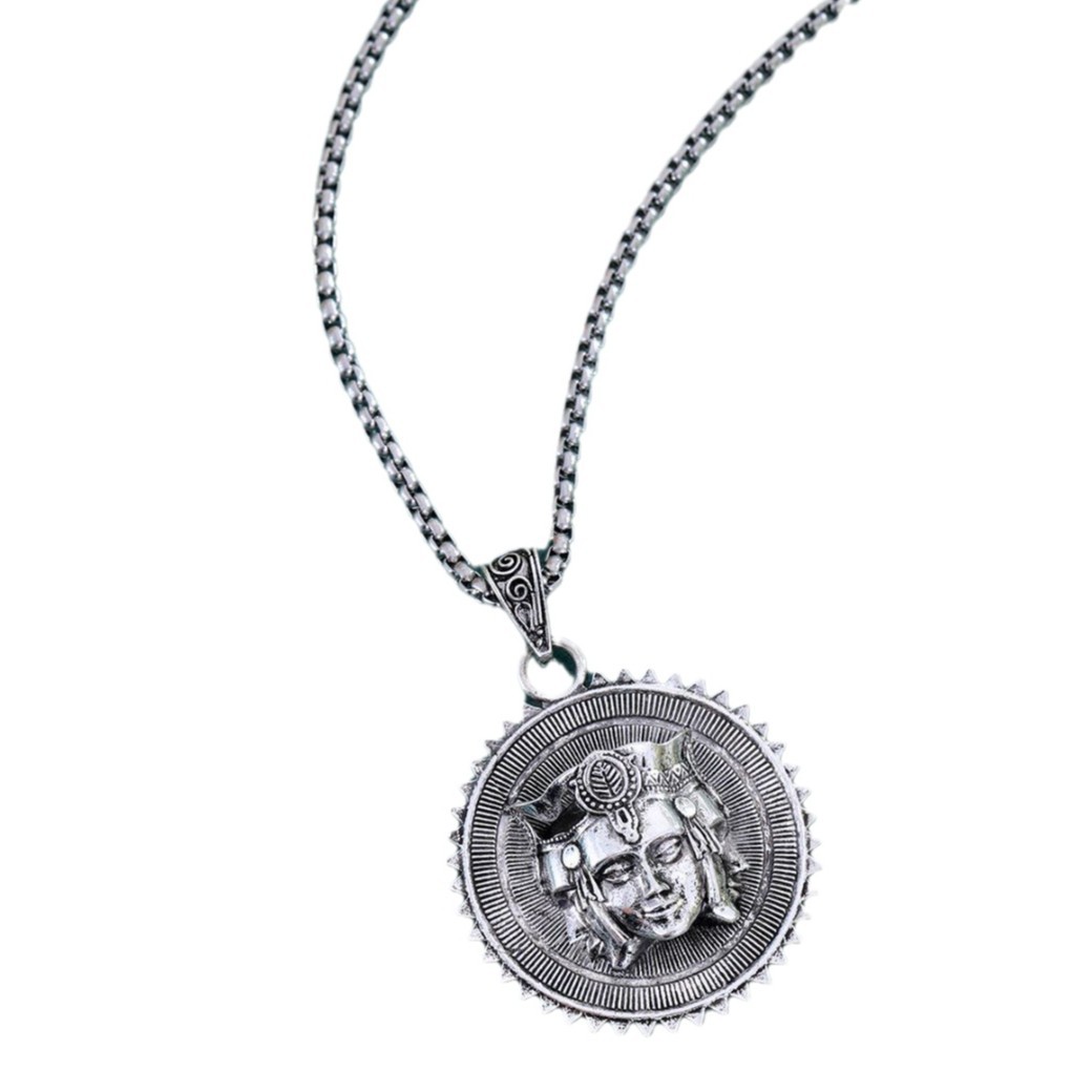 シルバーアクセサリー 神秘の円盤 仏面彫刻ネックレス