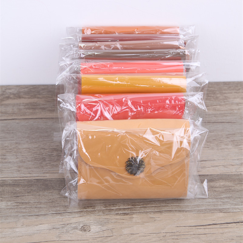 フラグメントケース 花飾り留め革製ミニ財布