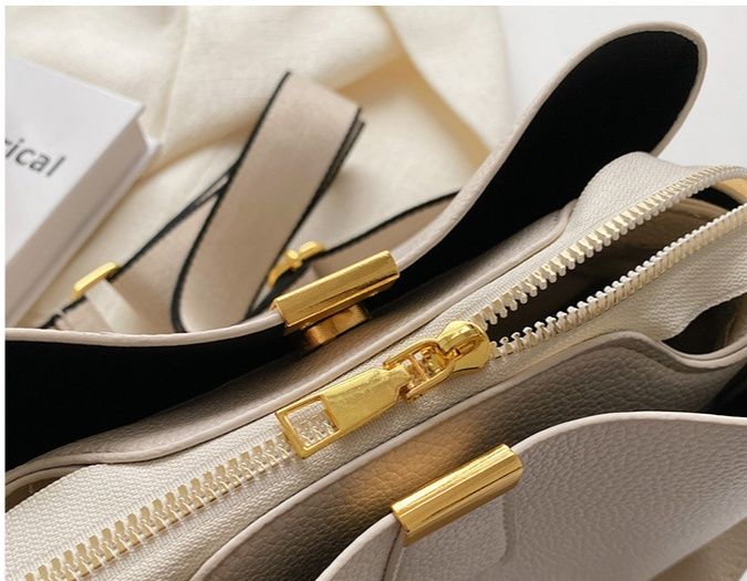 ショルダーバッグレディース上品な型押しレザー調バケツ型