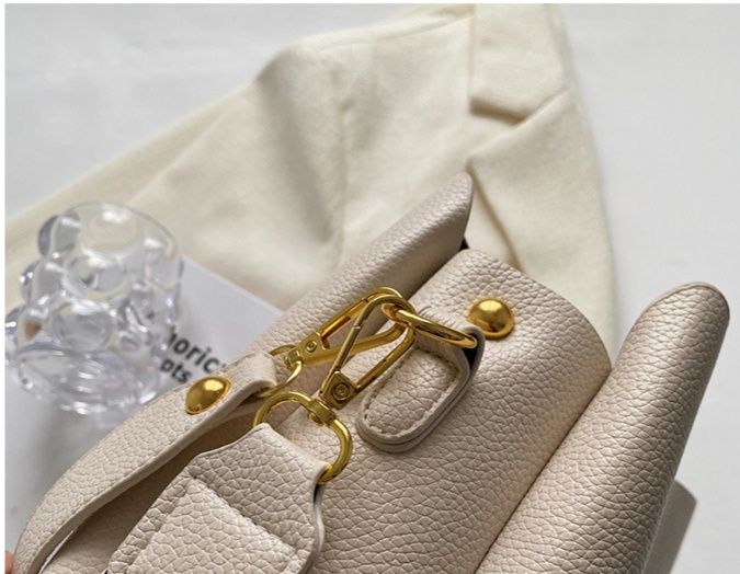 ショルダーバッグレディース上品な型押しレザー調バケツ型