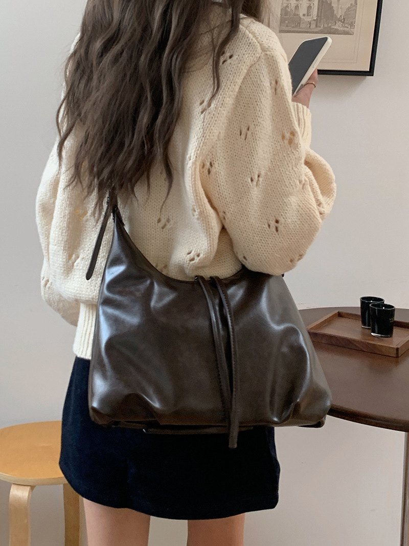 ショルダーバッグレディース柔らか合成皮革巾着デザイン