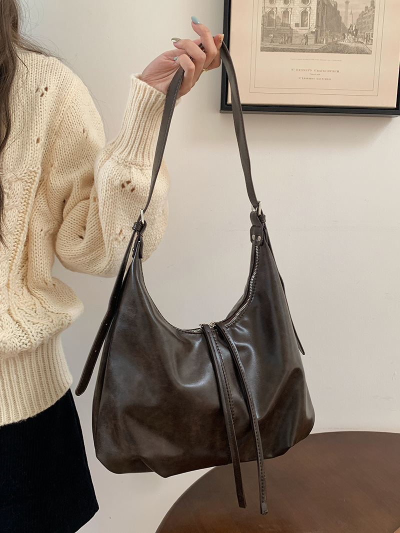 ショルダーバッグレディース柔らか合成皮革巾着デザイン