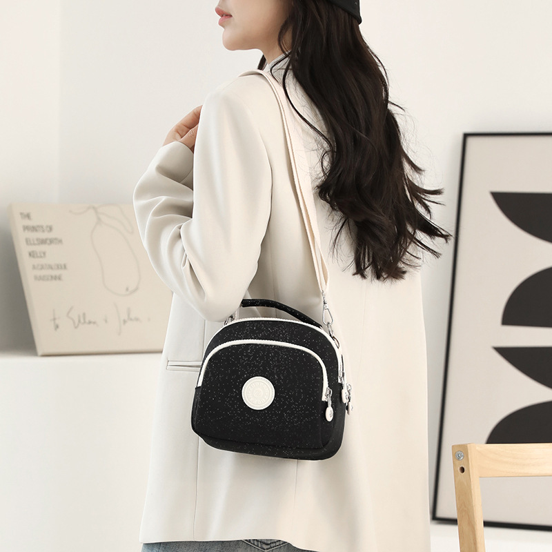 ミニ ショルダーバッグ きらきら星空柄丸型コンパクトクロスボディバッグ