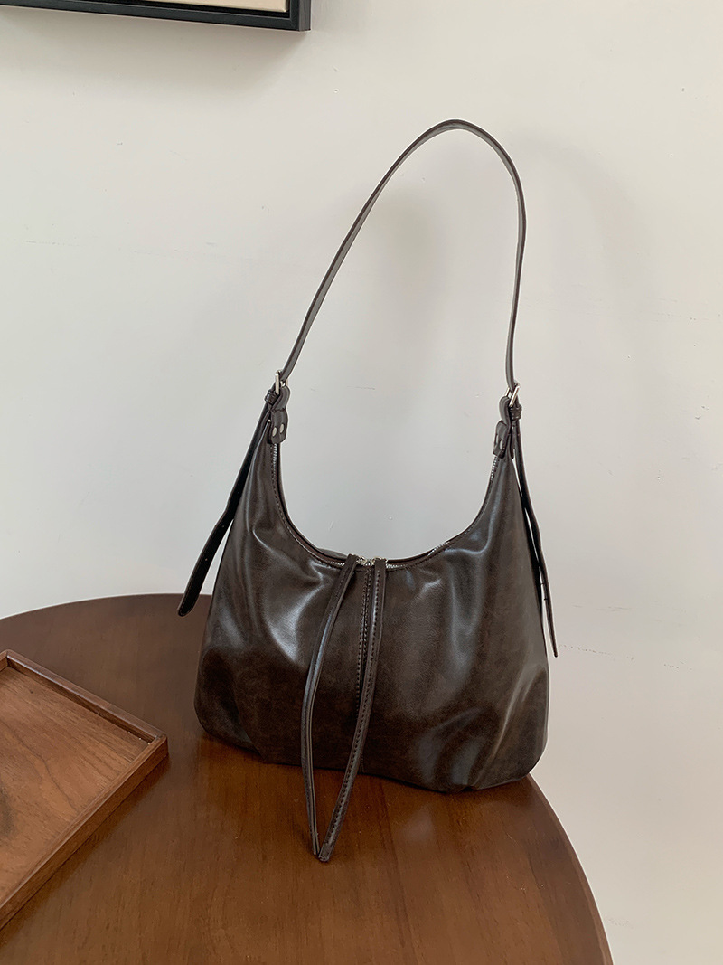 ショルダーバッグレディース柔らか合成皮革巾着デザイン