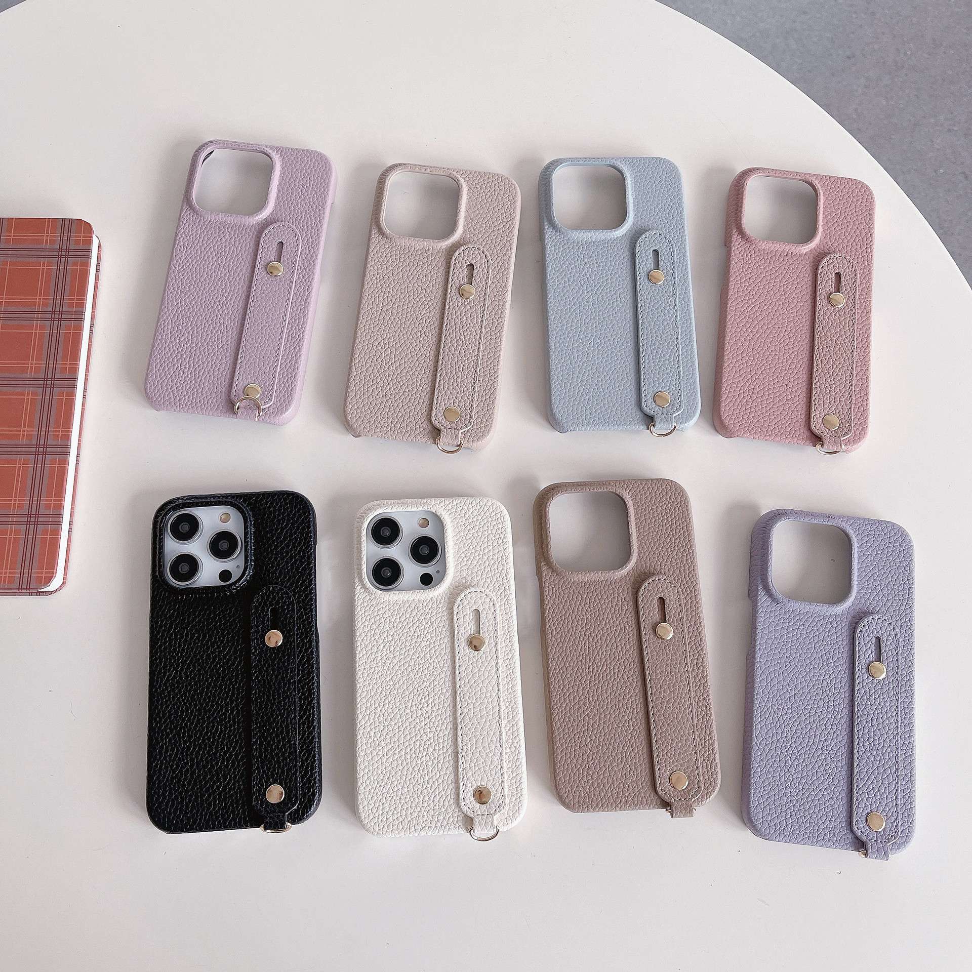 手帳型スマホケース  レザー調ハンドホルダー付きスマホケース