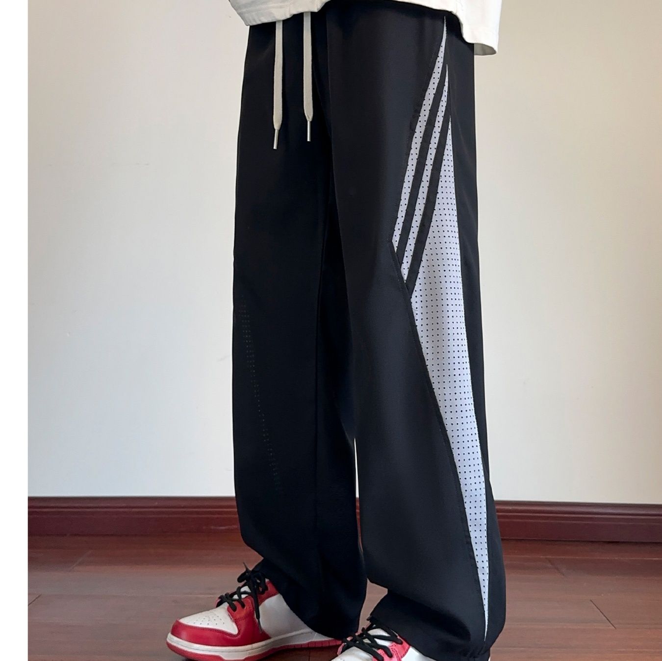 メンズスポーツウェア サイドライン ワイドトラックパンツ