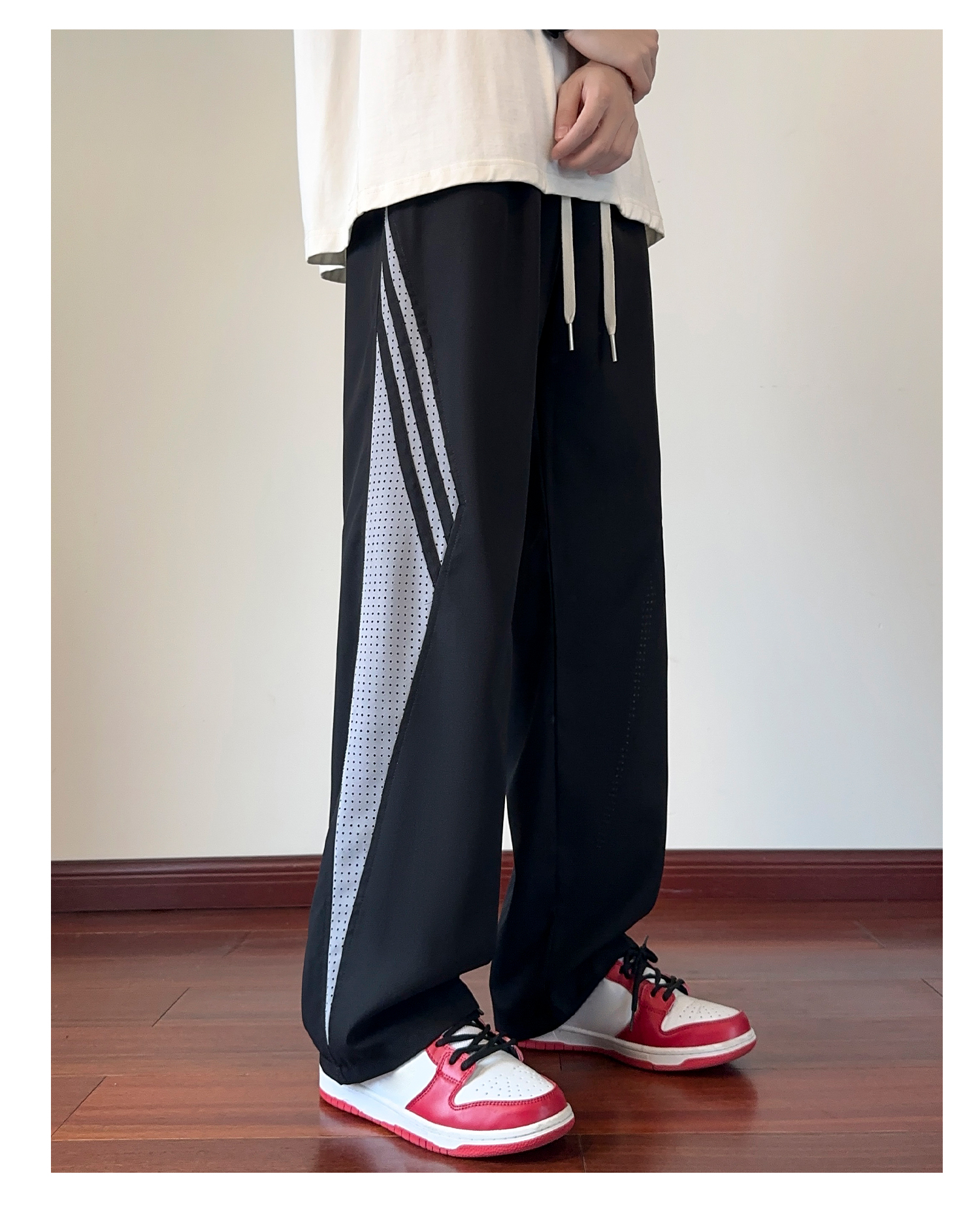 メンズスポーツウェア サイドライン ワイドトラックパンツ
