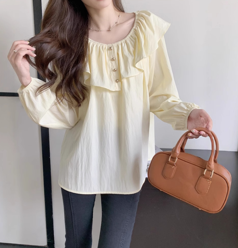 骨格ウェーブフリルブラウス