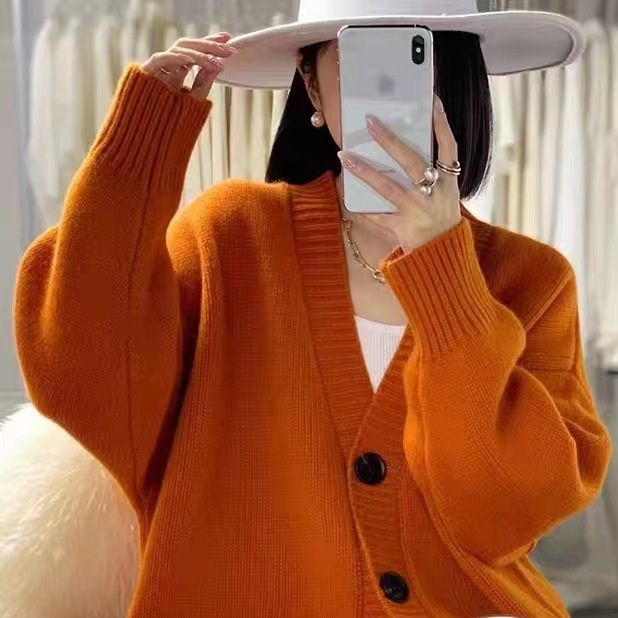 ストリートファッション ゆったりシルエット釦付きポケット袖絞りニットカーディガン