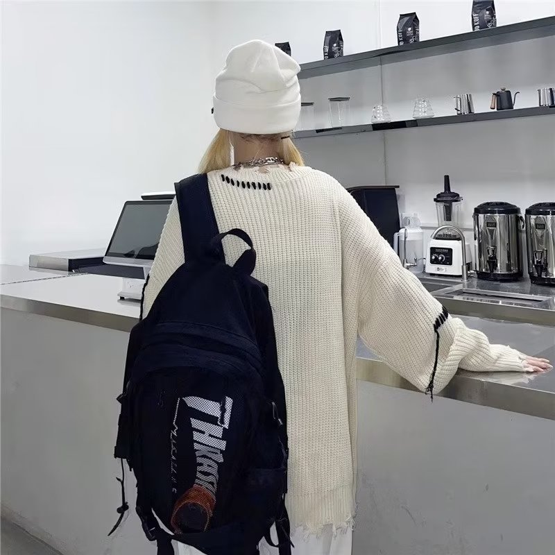 ストリートファッション ステッチデザイン裾ダメージニット