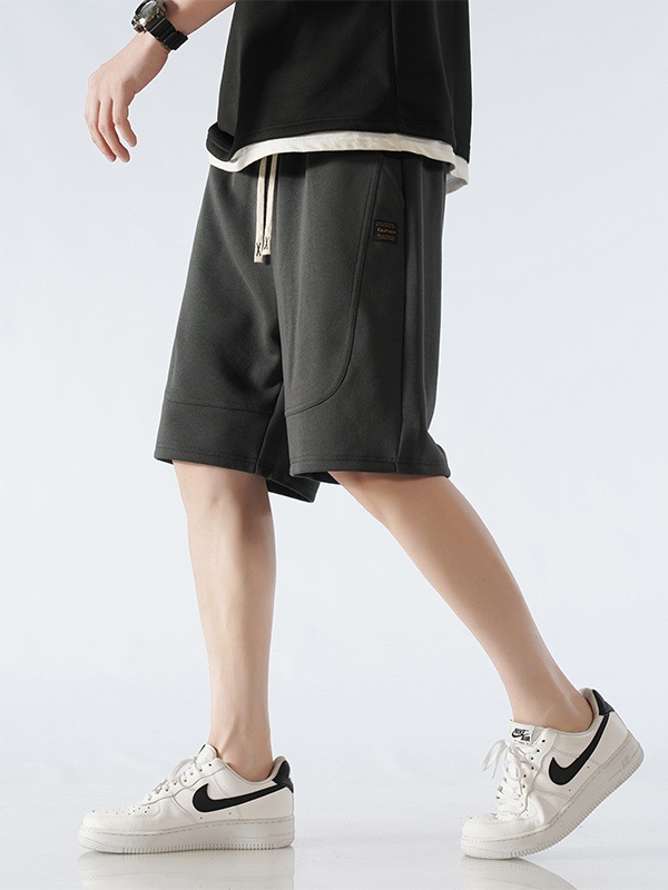 スウェットパンツ ゆったりシルエットの紐付きハーフパンツ