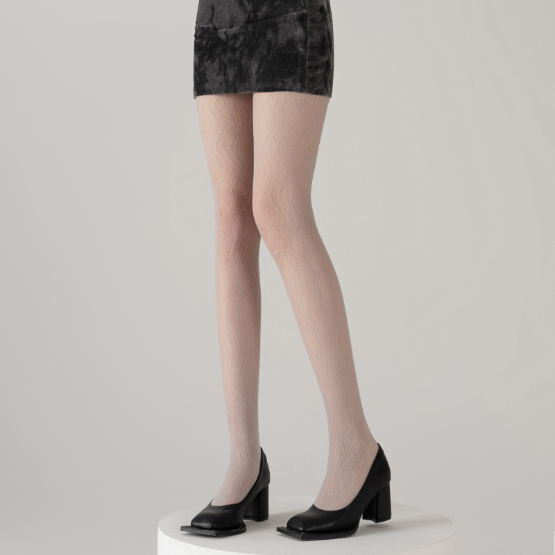 タイツ 縦縞リブ編み透け感美脚タイツ