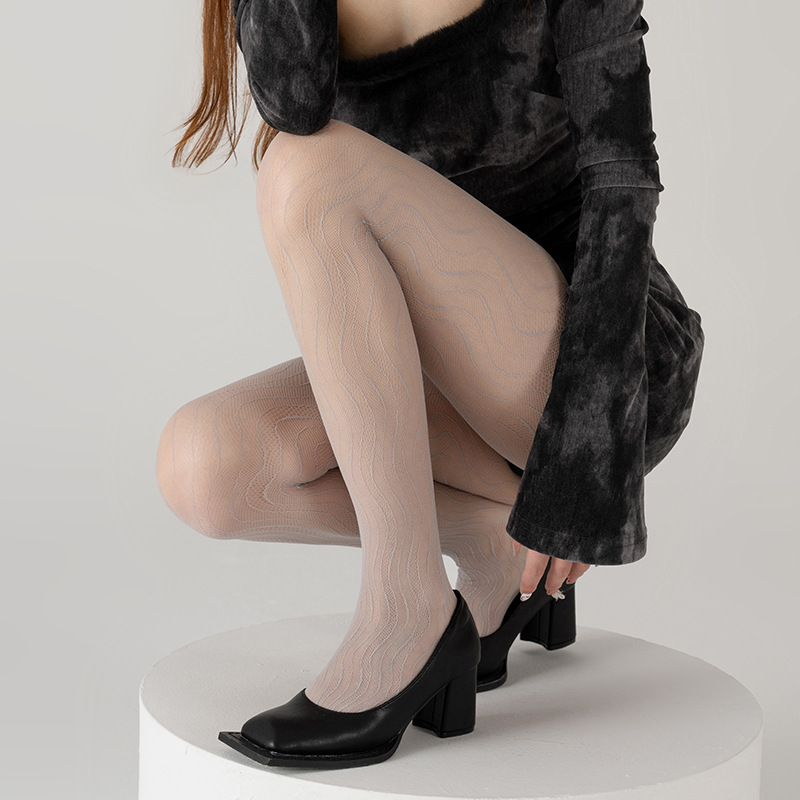 タイツ 縦縞リブ編み透け感美脚タイツ