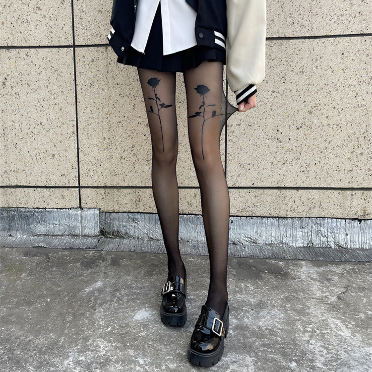 薔薇柄網タイツ 黒色 薄手 女性用 上品な透け感