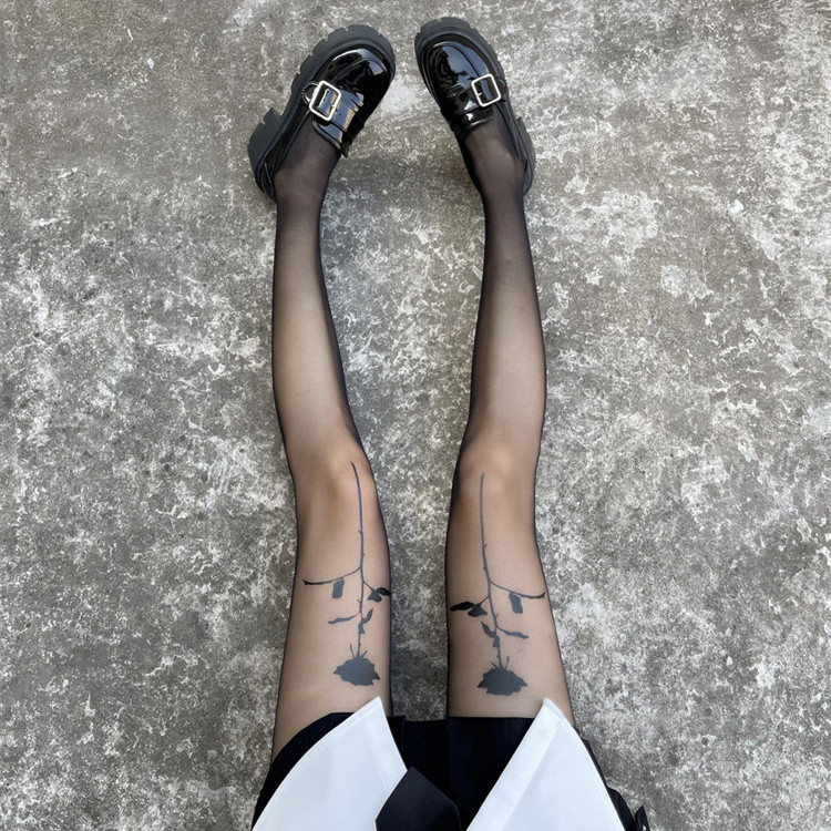 薔薇柄網タイツ 黒色 薄手 女性用 上品な透け感