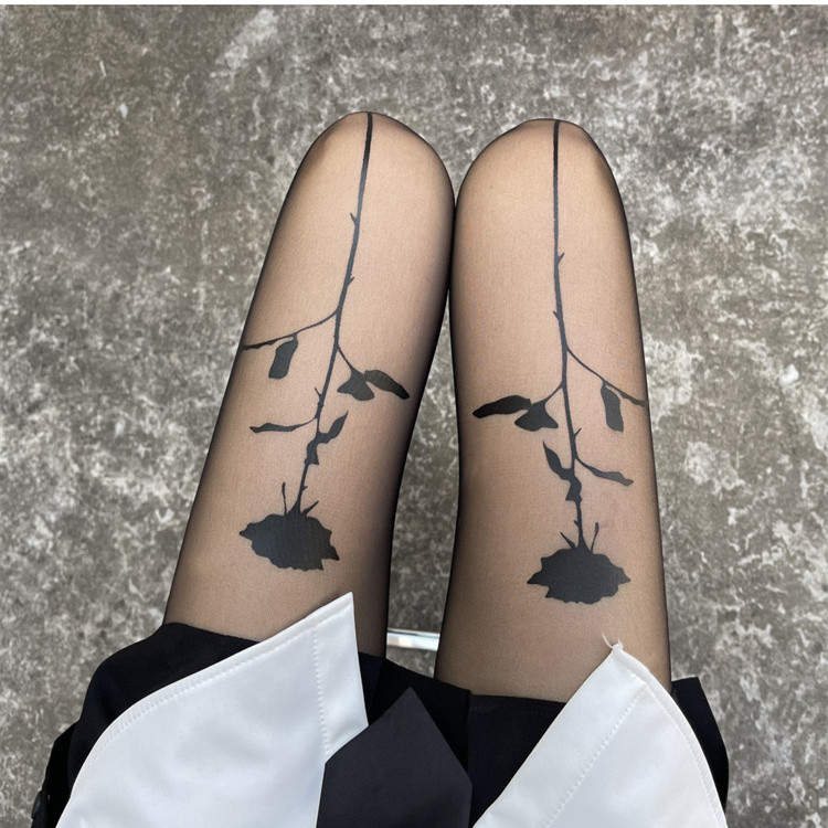薔薇柄網タイツ 黒色 薄手 女性用 上品な透け感