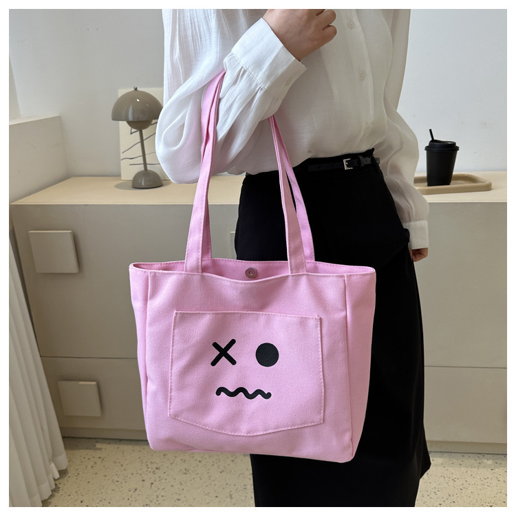 ユニーク表情刺繍入り大容量キャンバストート