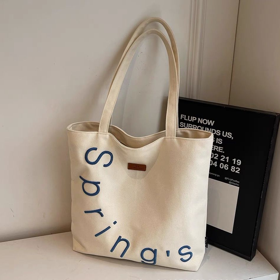 キャンバストート 文字デザインキャンバス地ショルダートート
