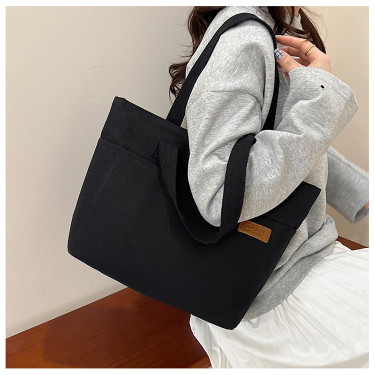 キャンバストート シンプル外ポケット付き帆布バッグ