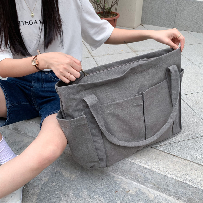 キャンバストート ゆとりポケット付き 多機能トートバッグ
