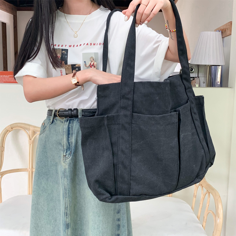 キャンバストート ゆとりポケット付き 多機能トートバッグ